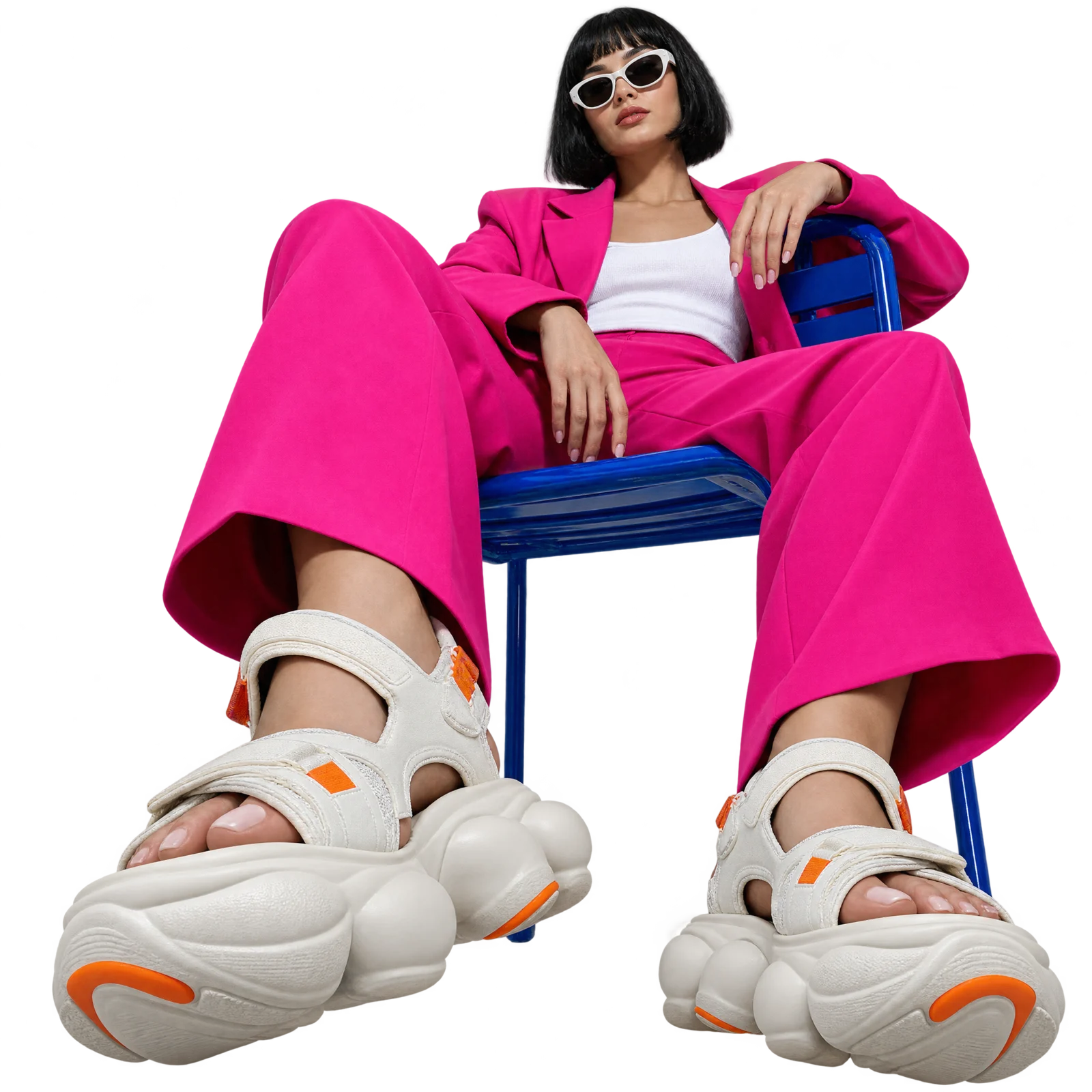 Model in a fuchsia suit wearing Bubble Drift sport sandals
